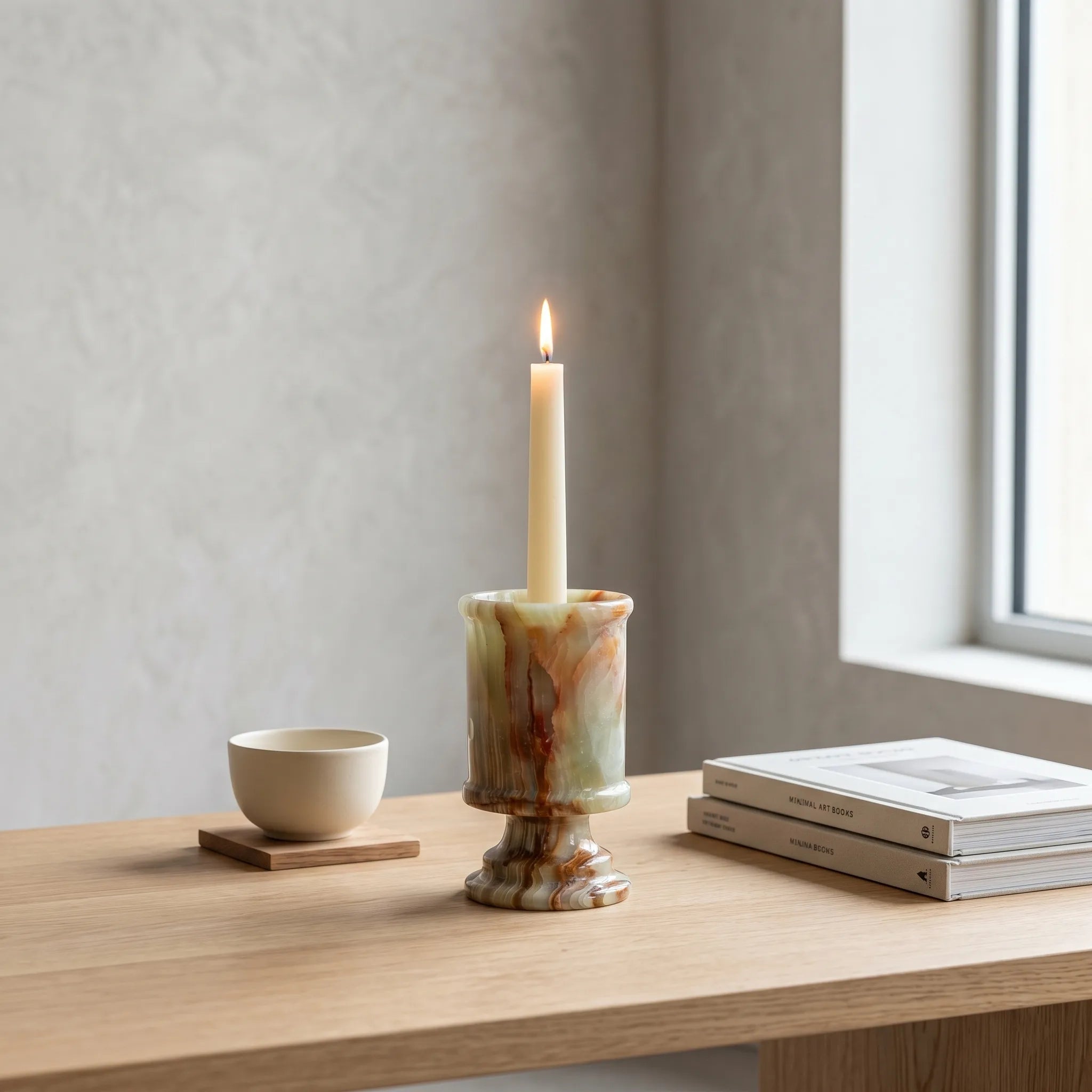 Natural agate pedestal candle holder, luxury spa bathroom sanctuary decor, minimalist stone centerpiece with soft candlelight