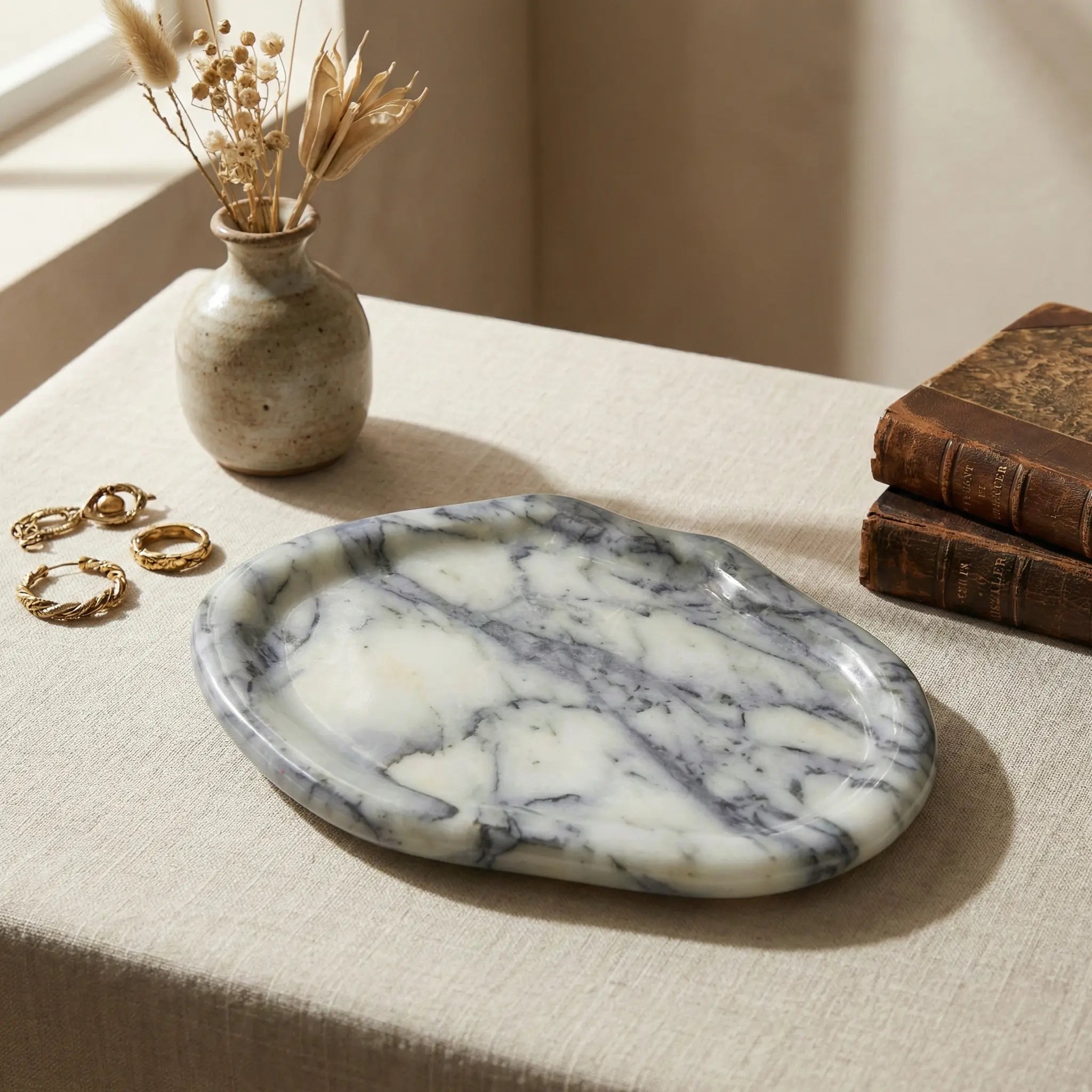 Irregular Marble Platter used as a minimalist stone entryway tray for keys and accessories
