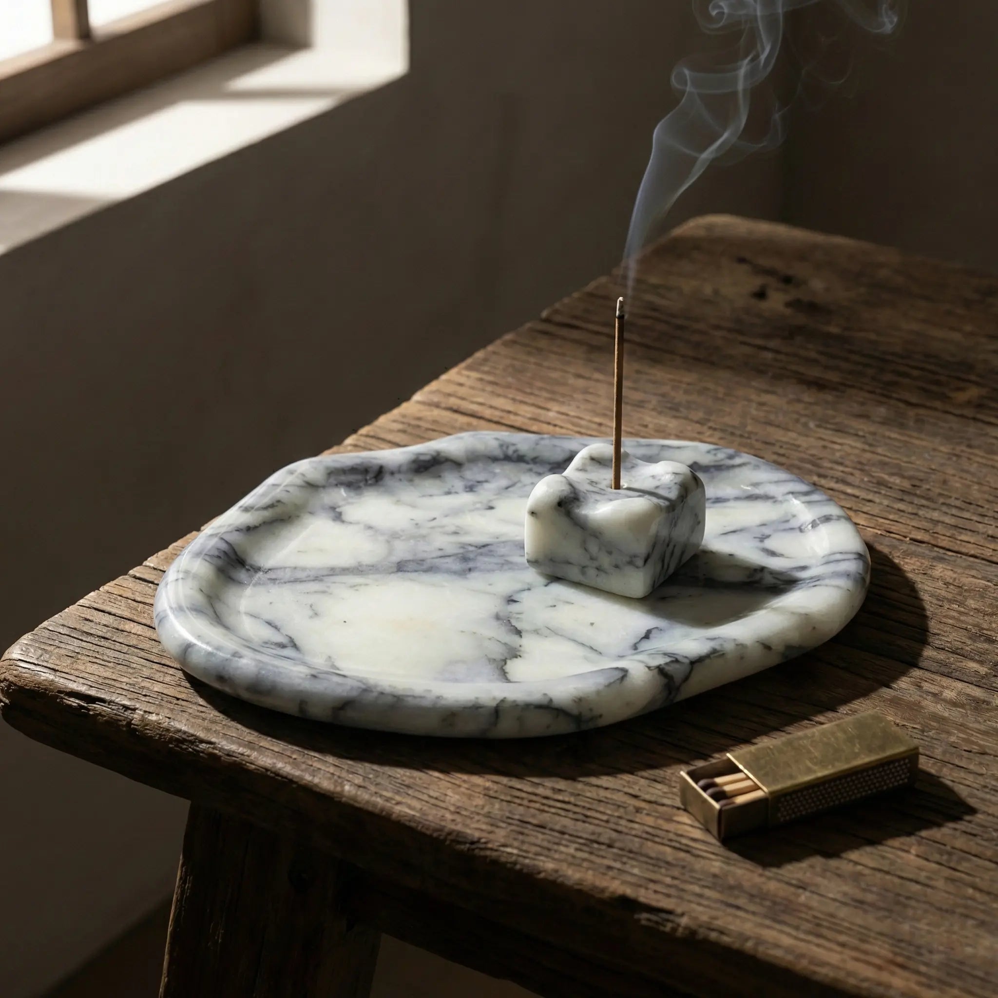 Irregular Marble Platter as a stone incense burner base with smoke in a rustic setting