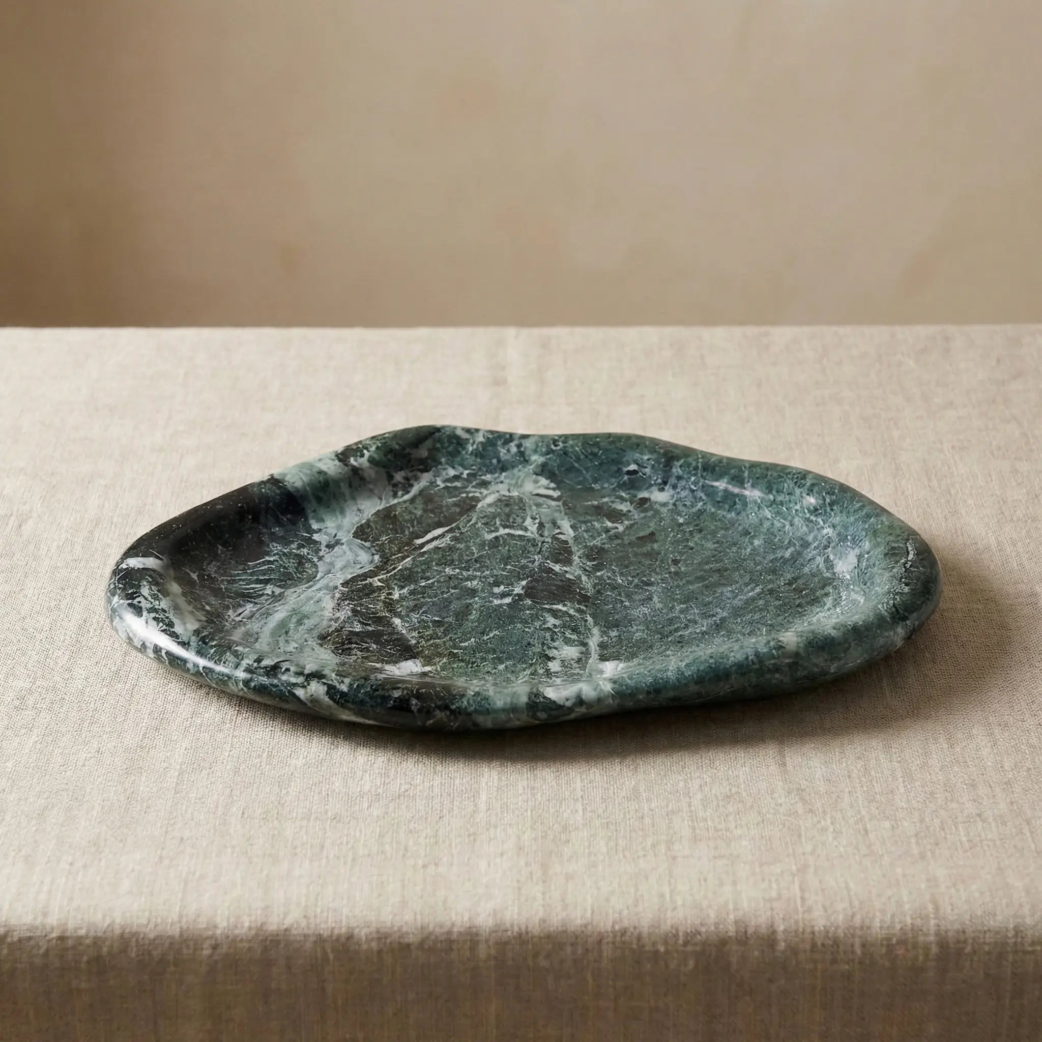 Marble Cloud Tray in forest green natural stone with an organic cloud-shaped design
