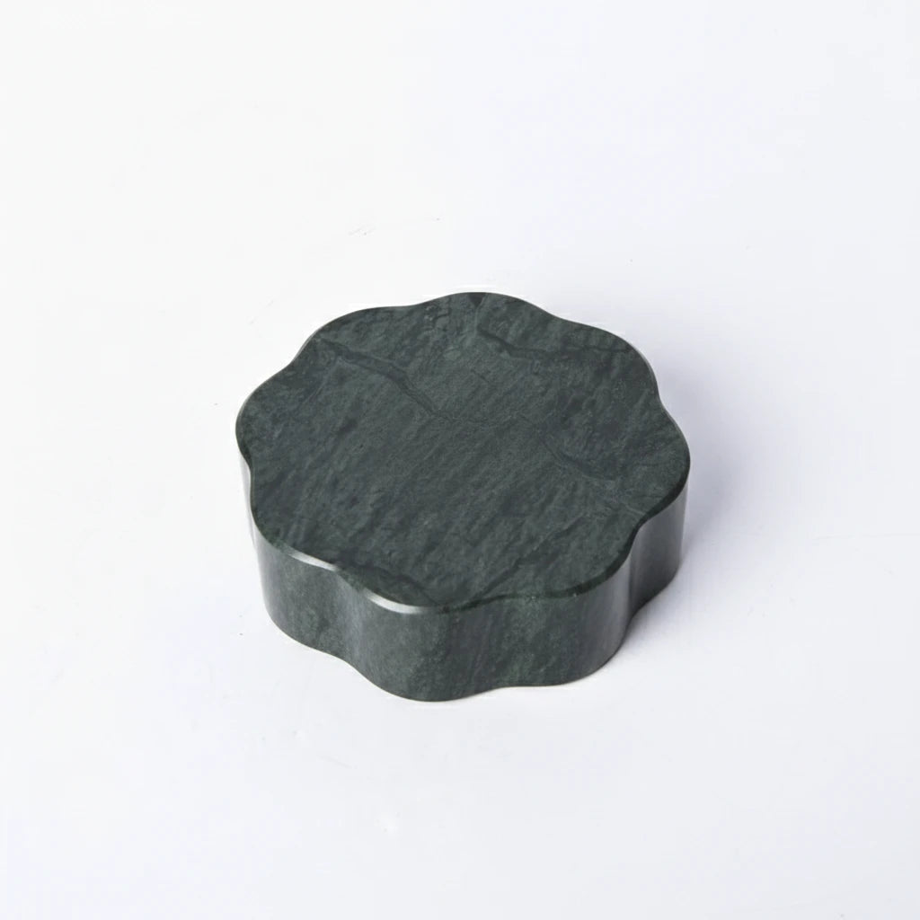 Bottom view of Marble Petal Holder showing the smooth handcrafted forest green stone finish