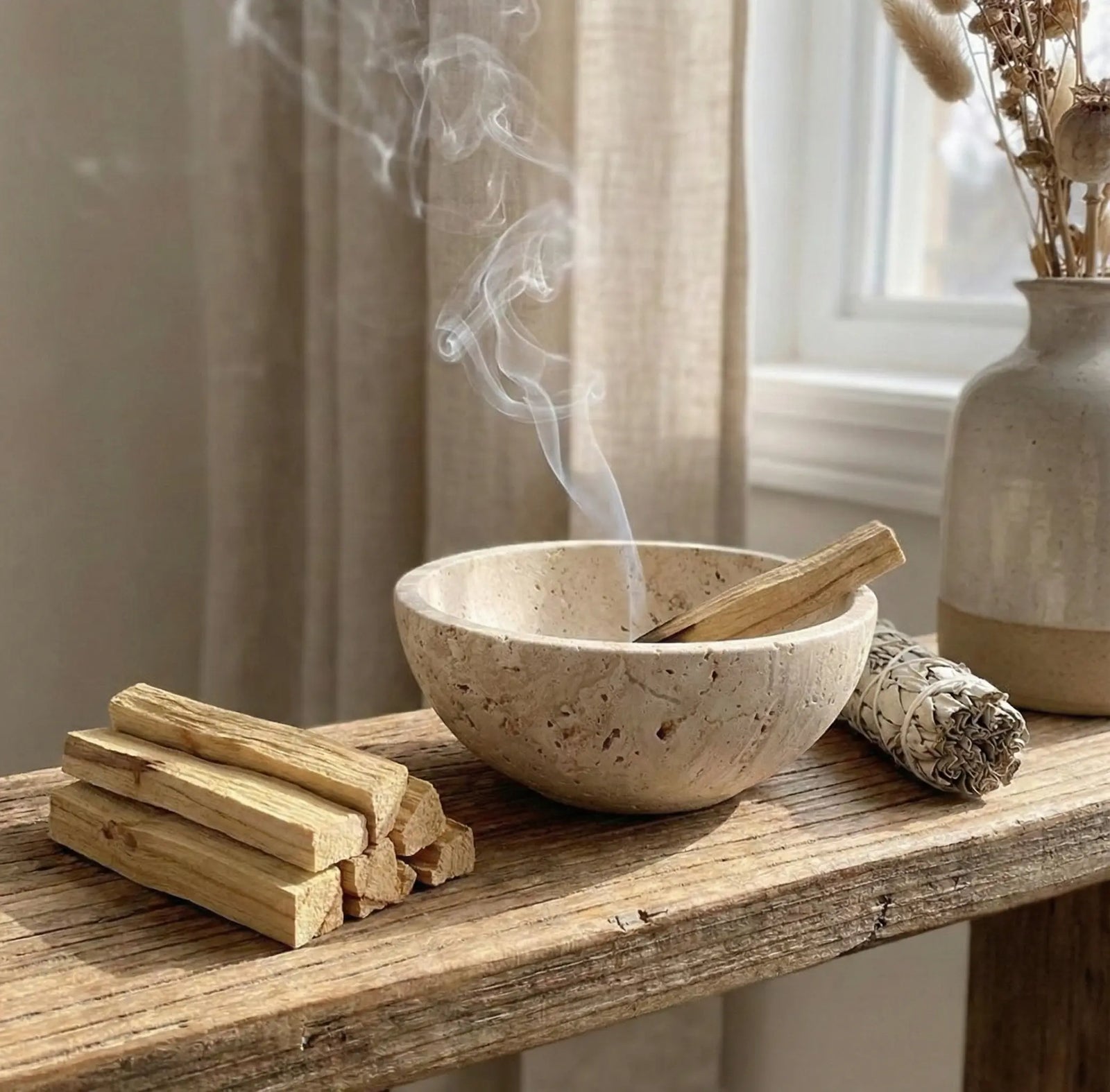 Travertine Chalice Bowl used as a stone incense holder with burning Palo Santo in a zen setting