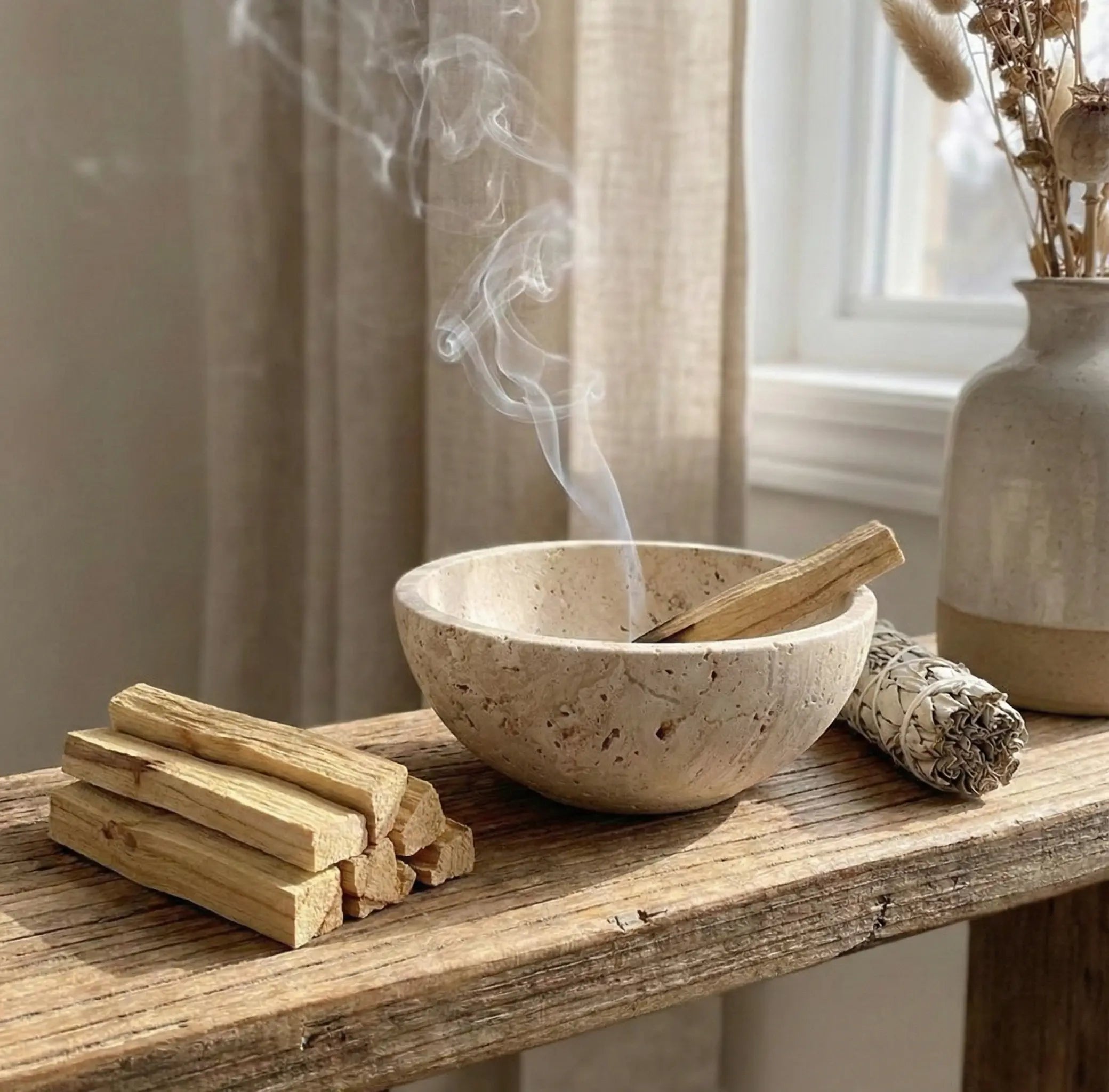 Travertine Chalice Bowl used as a stone incense holder with burning Palo Santo in a zen setting