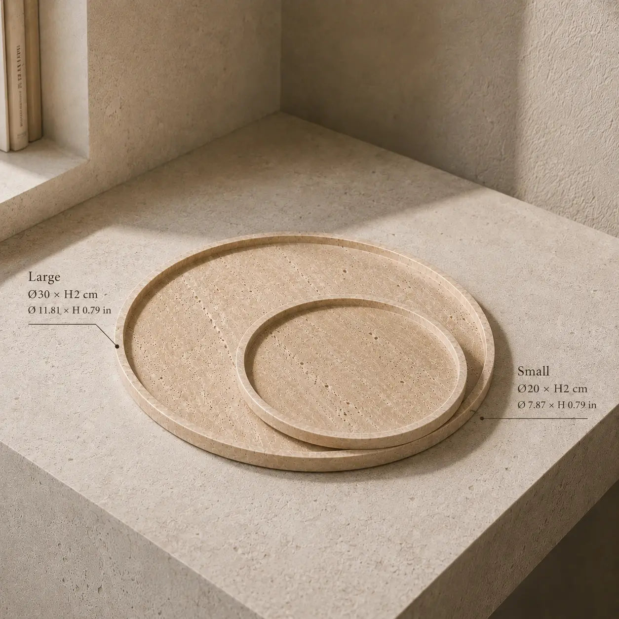 Size comparison of small 20 cm and large 30 cm round travertine trays with dimensions shown in centimeters and inches.