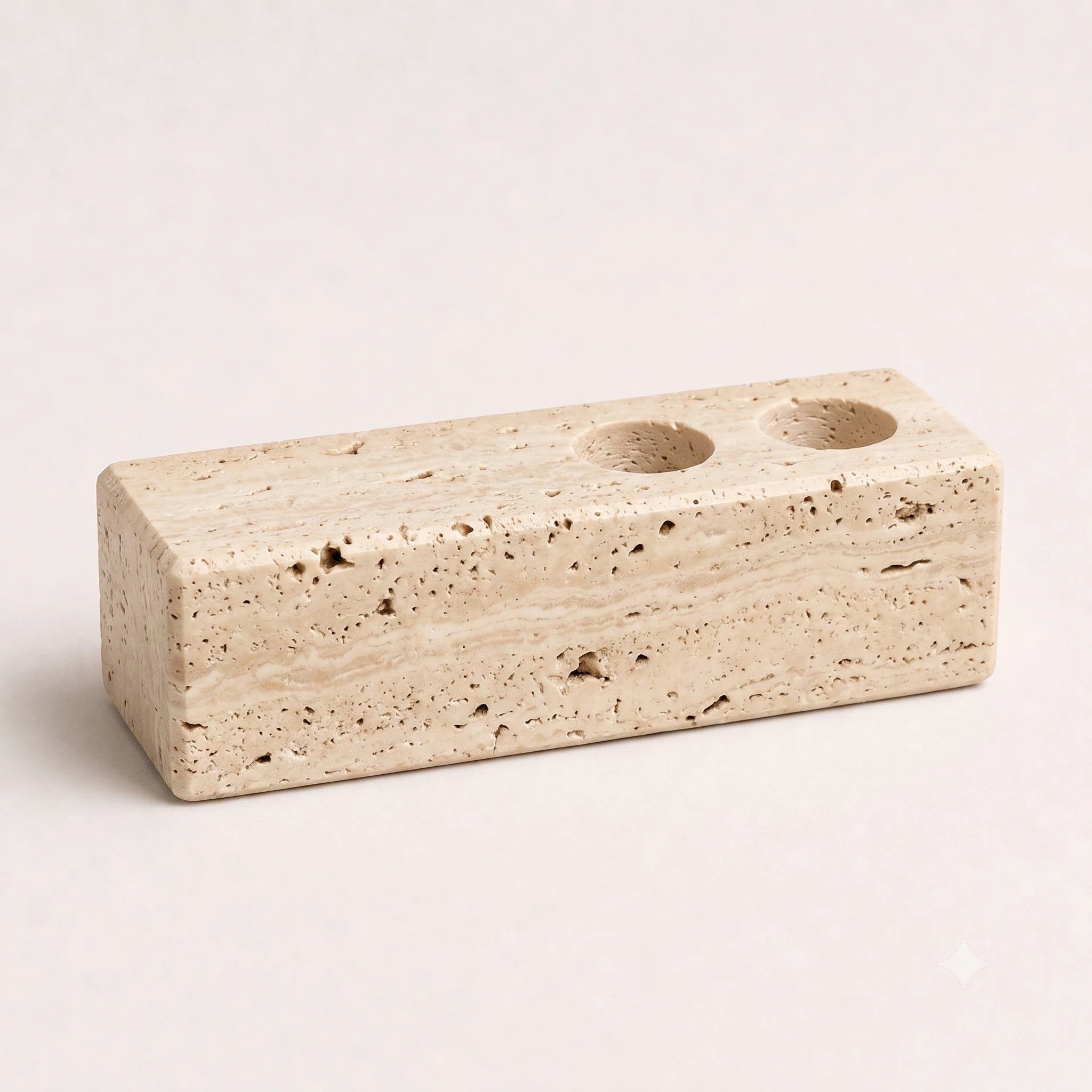 Travertine double candle holder.