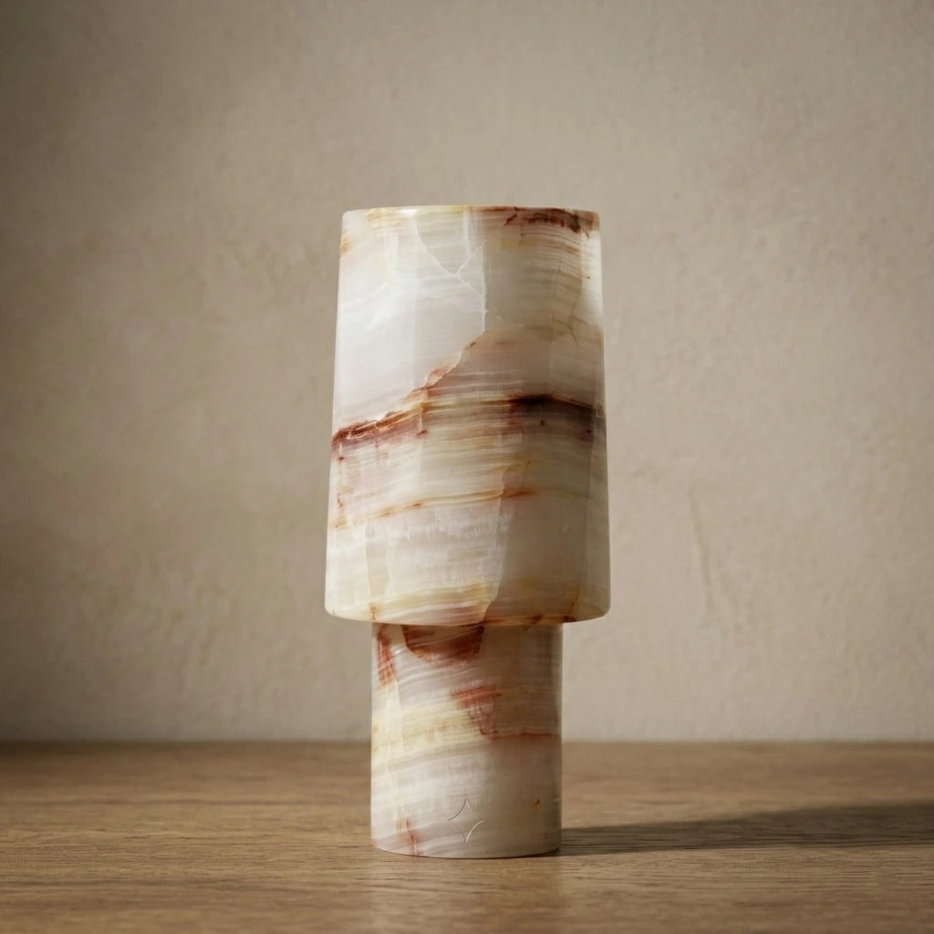 Sleek Monolith Vase handcrafted from natural stone with unique layered textures and sculptural form.