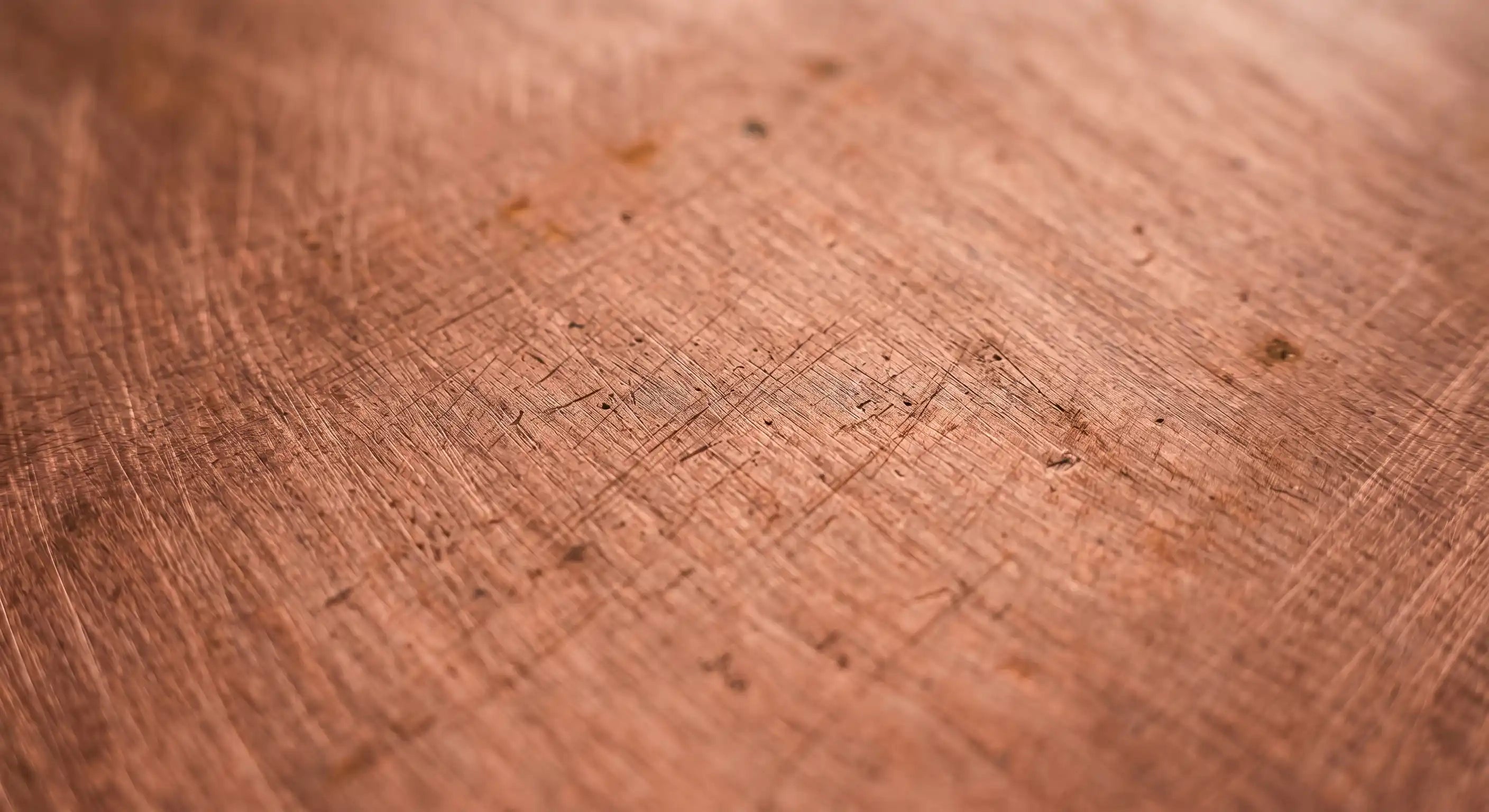 Brushed brass metal texture with warm golden tones