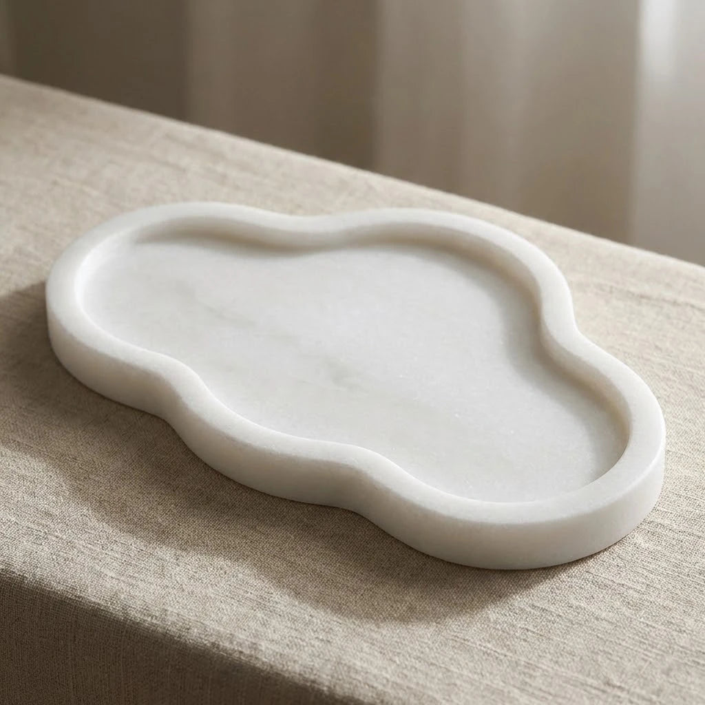 Calacatta White Cloud Tray handcrafted from 100% natural white marble in a minimalist organic cloud shape.