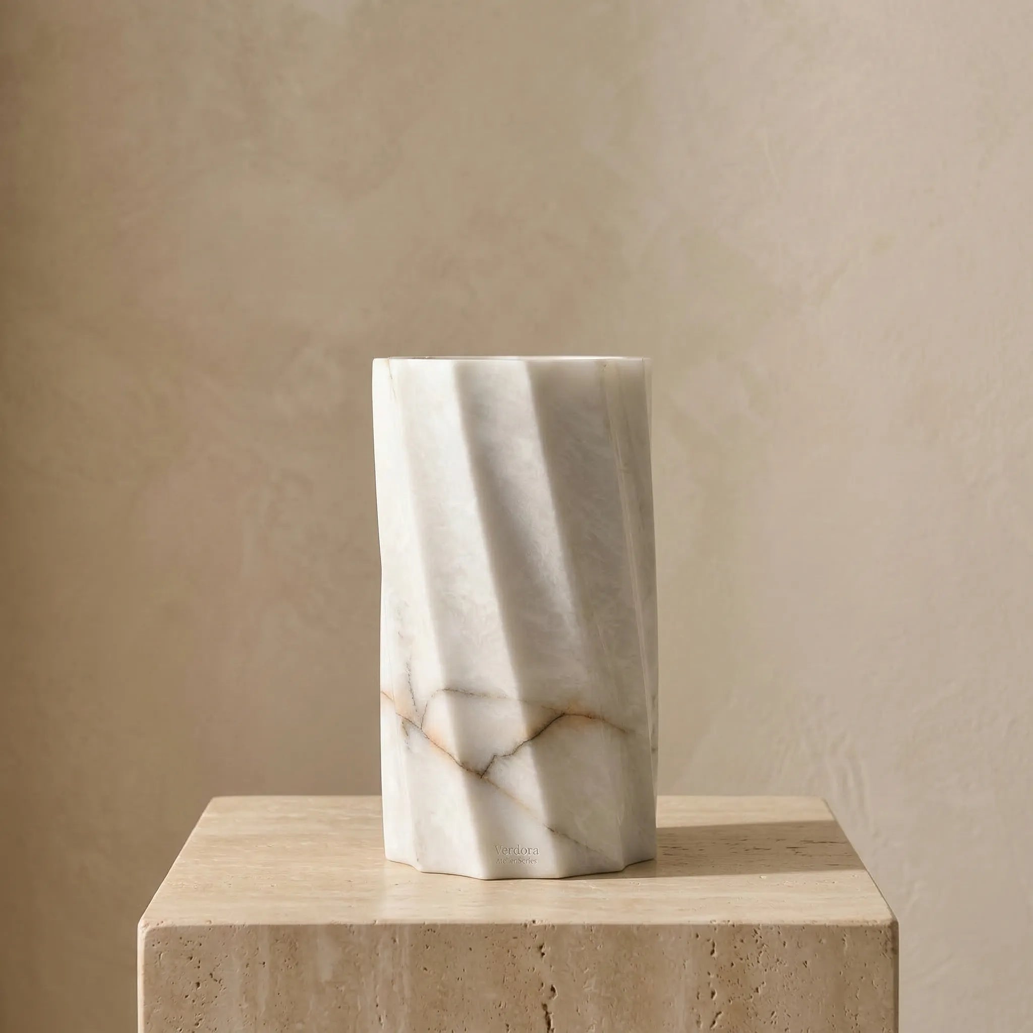 Cylindrical Monolith Vase handcrafted from 100% natural white marble stone with elegant carved spiral texture.
