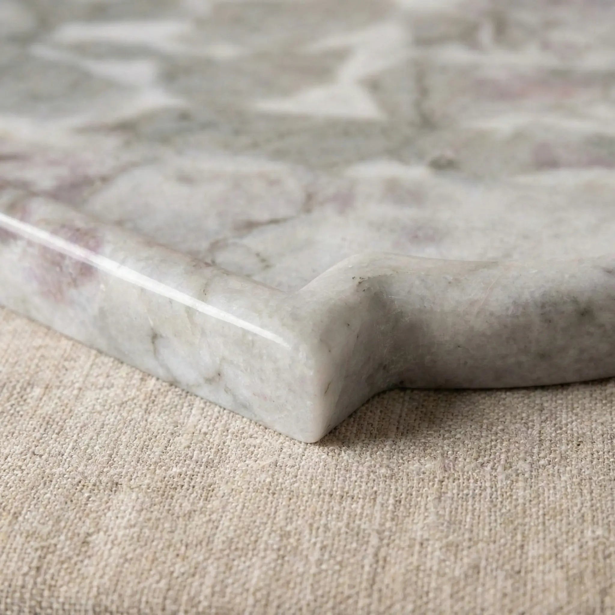 Macro shot of Nordic Marble Platter highlighting the smooth grey natural stone texture