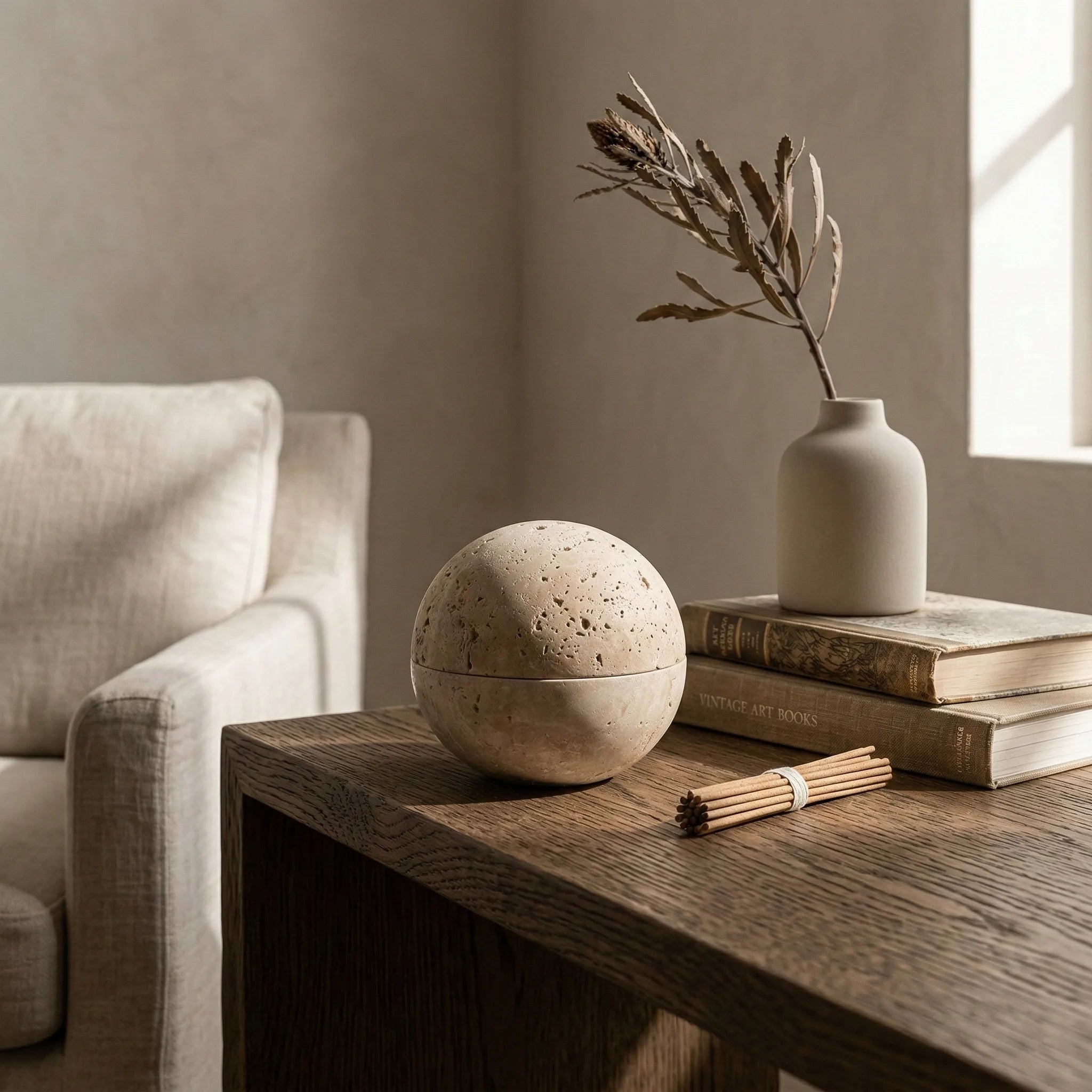 Travertine Core Vessel stone incense holder on a rustic wooden table as a tabletop accent