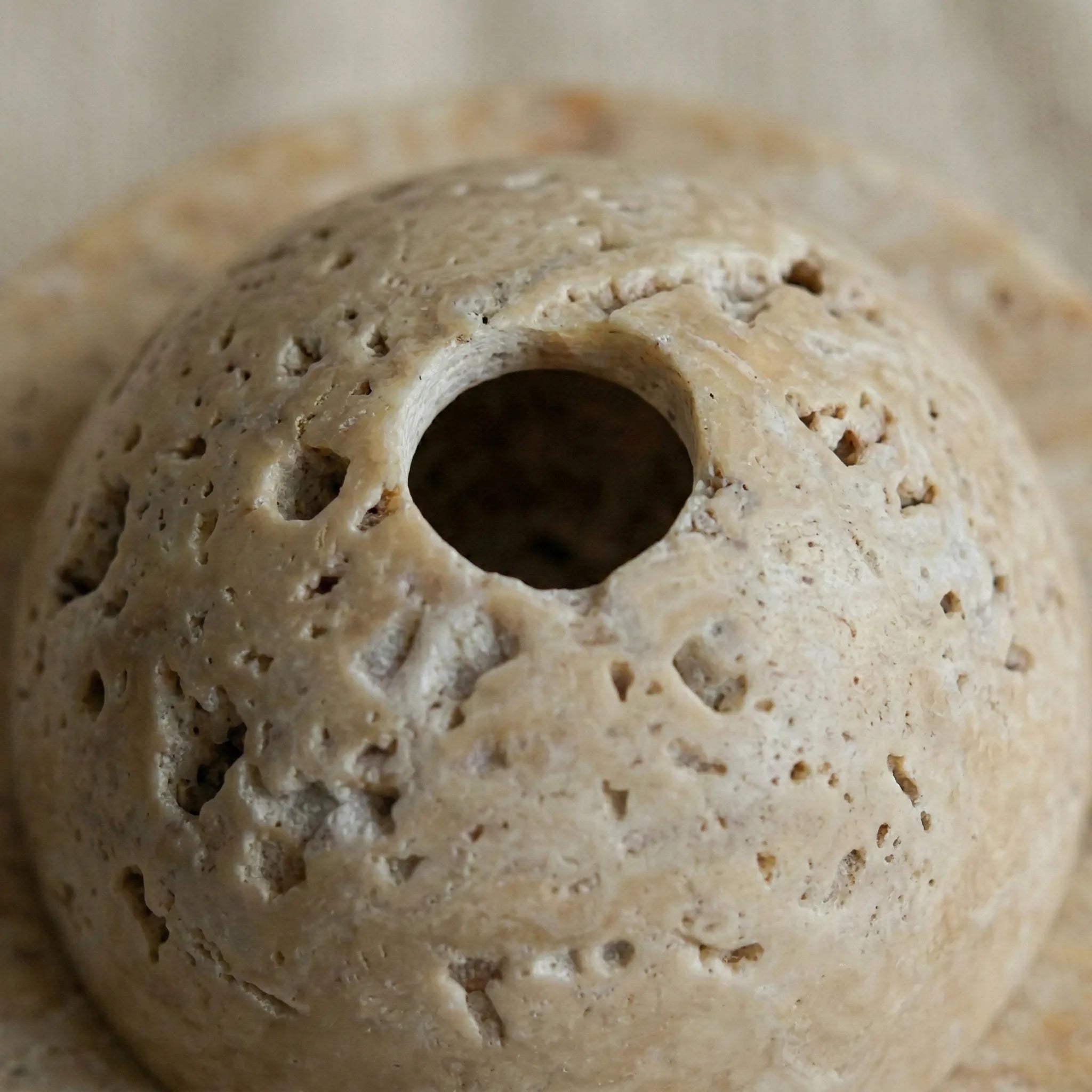 Top view of Travertine Relic Censer highlighting the raw and natural pitted stone texture