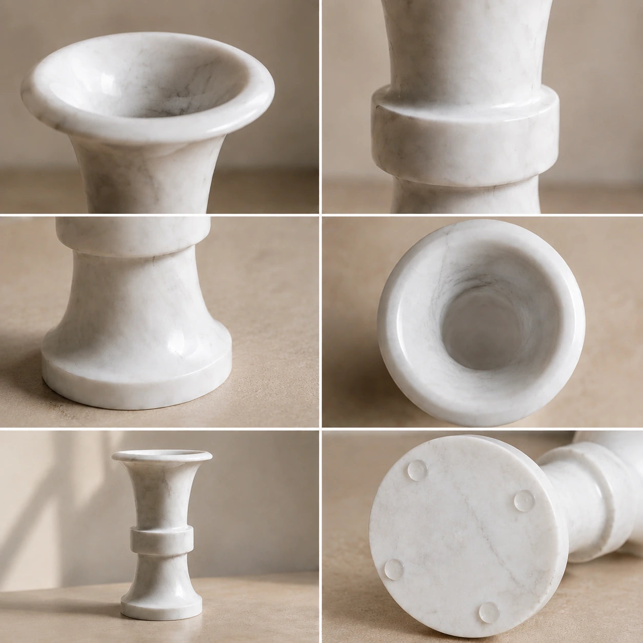Detail view of a white natural marble flared candle holder showing its sculptural trumpet shape, polished finish, subtle grey veining, and transparent silicone protective feet.